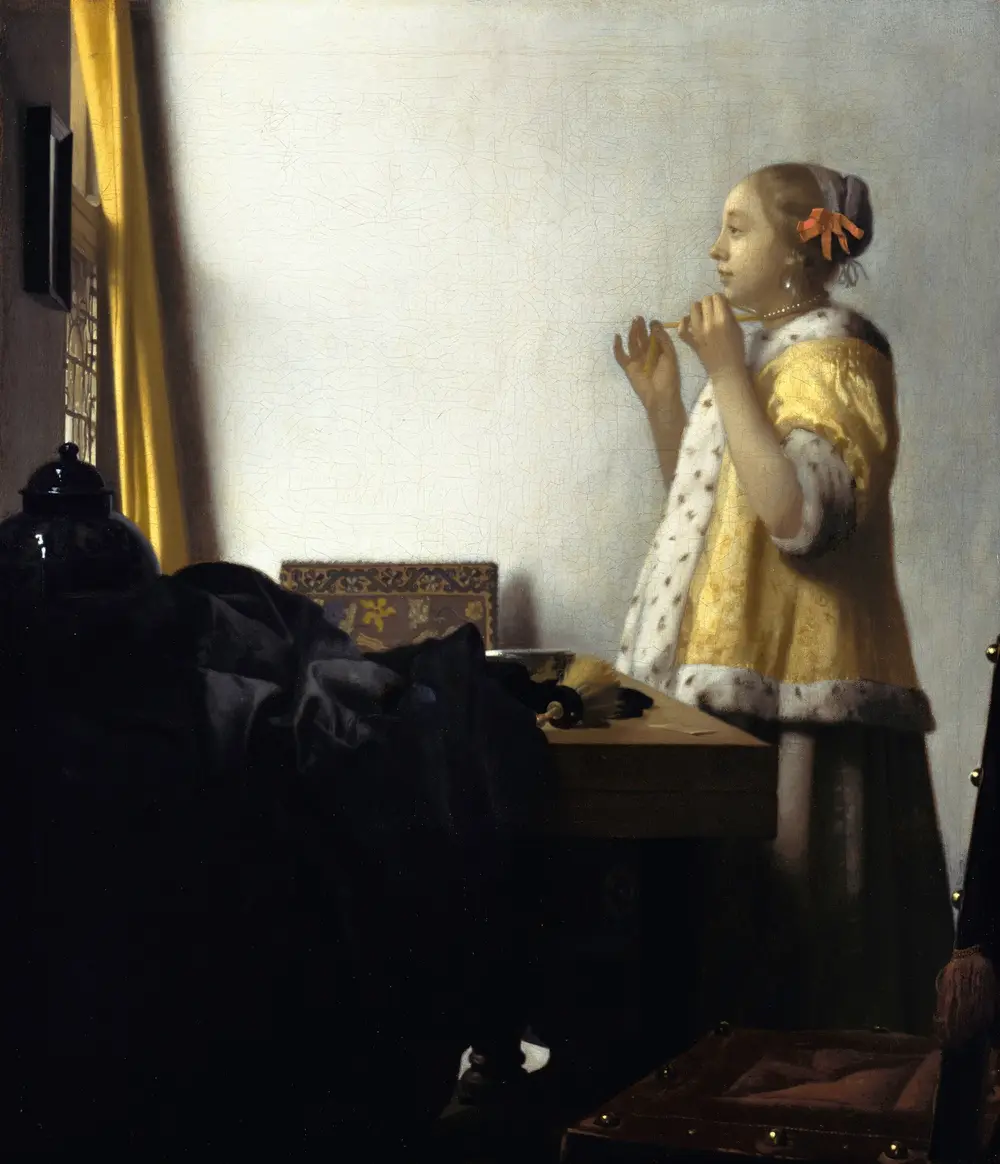 Woman with a Pearl Necklace — Johannes Vermeer