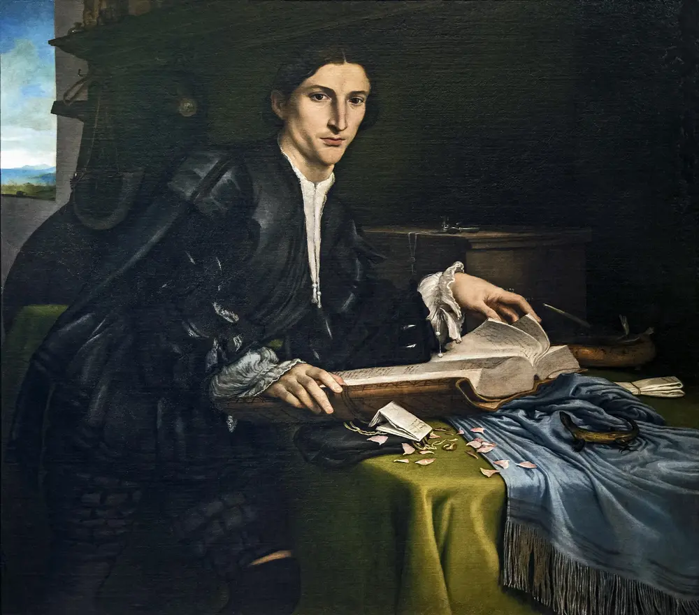 Portrait of a gentleman in his studio — Lorenzo Lotto